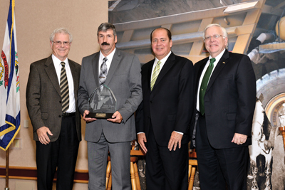 The-Because-of-You-Homer-Hickam-Collier-Award-winner-Delbert-Weaver-second-from-left-along-with-Hickam-Tomblin-and-Kopp