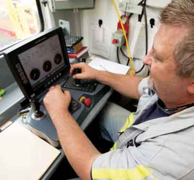 Raisebor’s James Bass operates the 123RH C raise boring machine from the quiet comfort of its remote operator station.