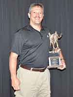 Alpha southern West Virginia captain Mark Bolen with the award for Day 2 mine rescue.