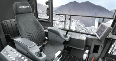 Inside the cab of Hitachi’s new electric-powered excavators, fluid-filled elastic mounts reduce shock and vibration by up to 30%, and an advanced multidisplay monitor provides key machine status information.